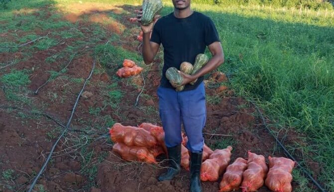 Herbet Zikhali Ncube with his butternut harvest in Lobamba Lomdzala. (Photo: Eswatini National Youth Council)