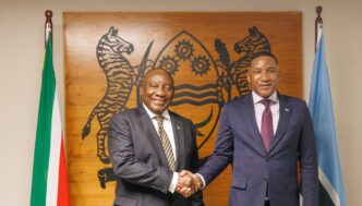 Botswana President Duma Boko and South African President Cyril Ramaphosa shake hands at the Office of the President in Botswana
