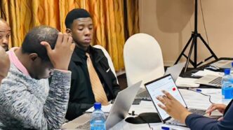 Government officials going through the report drafting process. Photo: Eswatini Government