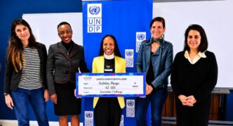 Peace Farm founder Katleho Mpopo displays her M62,000 Lesotho Innovation Challenge cheque alongside stakeholders. | Photo: NUL Research and Innovations