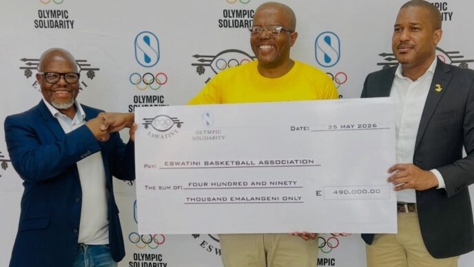 Officials from the Eswatini Olympic and Commonwealth Games Association (EOCGA) and Basketball Eswatini pose with the E490,000 cheque during the official launch of the Development of National Sports System (DNSS) Programme, funded through Olympic Solidarity.