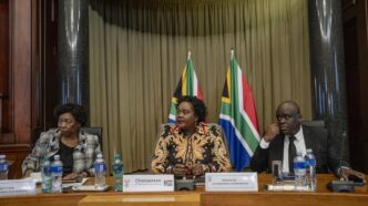 Defence minister Angie Motshekga, justice minister Mmamoloko Kubayi, and deputy home affairs minister Njabulo Nzuza brief the media after a closed-door meeting about illegal immigration. Photo: Ihsaan Haffejee