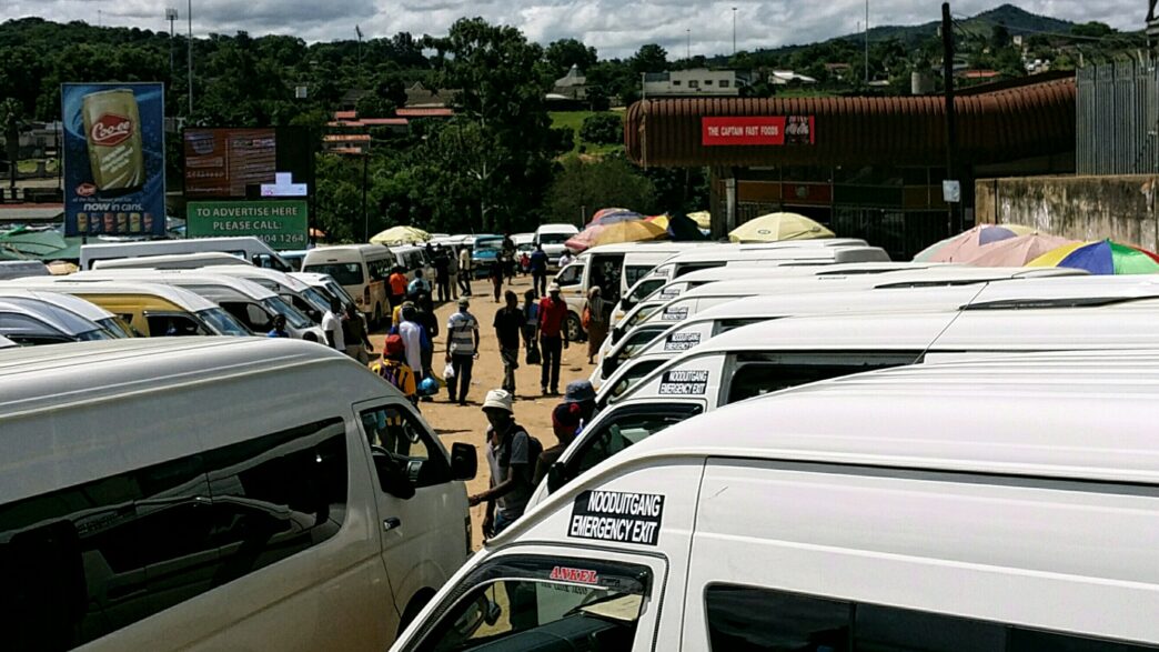 A view of the Manzini bus rank with public transport. Photo by Kirby P