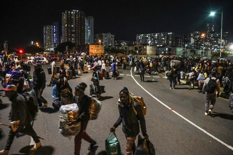 Malawian nationals arrive in large numbers at a repatriation centre in Durban’s city centre on 23 June, ahead of their voluntary return to Malawi. (Photo: Felix Dlangamandla)