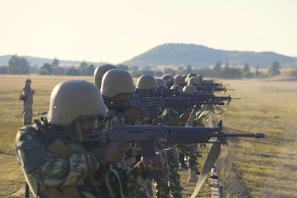 Participants from Mozambique fire on their targets. Photo by SANDF