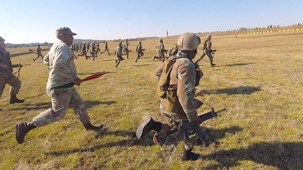 Members of South African Army Regulars Team B charge to their next firing point during the final Chief of the South African Army Combat Rifle Shooting Evaluation 2026 day's Adjusted Table (13) Fire and Movement "Run Down"