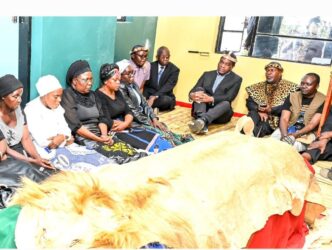 President Hakainde Hichilema consoles Paramount Chief Mpezeni IV's widow Esther Mbewe and family members at Ephendukeni Palace in Chipata. | Photo: State House Zambia