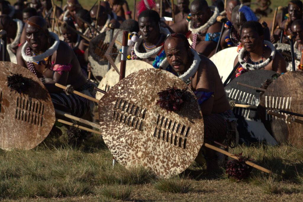 King Mswati III addresses regiments and community members at Ngabezweni Royal Residence during the dispersing ceremony following the harvest season. Photo: Eswatini Ministry of Home Affairs