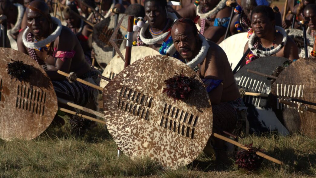 King Mswati III addresses regiments and community members at Ngabezweni Royal Residence during the dispersing ceremony following the harvest season. Photo: Eswatini Ministry of Home Affairs