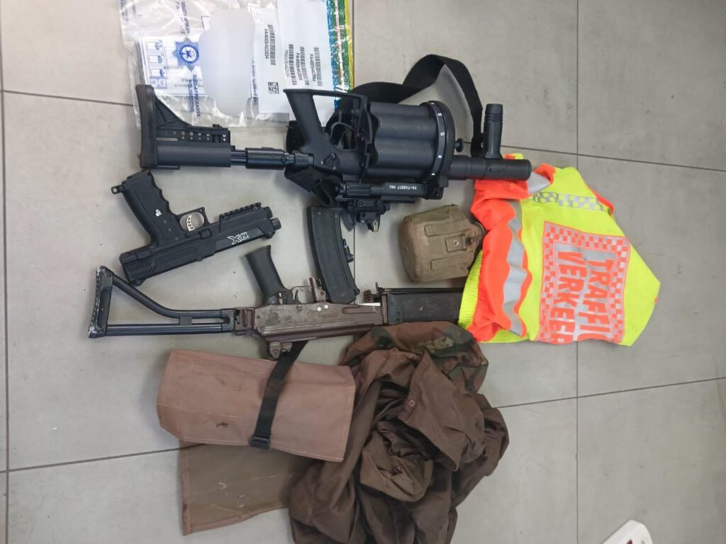 Two suspects were arrested after they were found in possession of stolen military uniform and firearms. (Photo: SAPS)