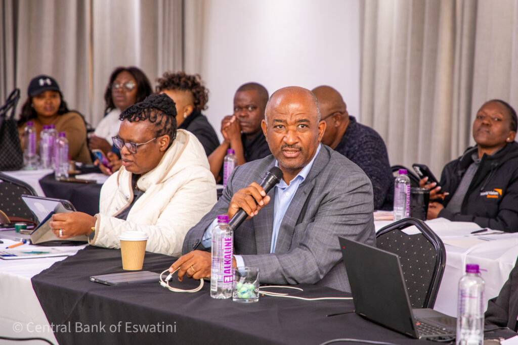 Central Bank of Eswatini Governor Dr. Phil Mnisi addresses editors and journalists during the Governor's Annual Media Engagement Session at Sibebe Resort on Friday. (Photo: CBE)