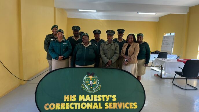 Superintendent Nokuthula Zwane with the (CMOs) during the closing of the Introductory Case Management Course at Matsapha Correctional Centre. Photo by HMCS