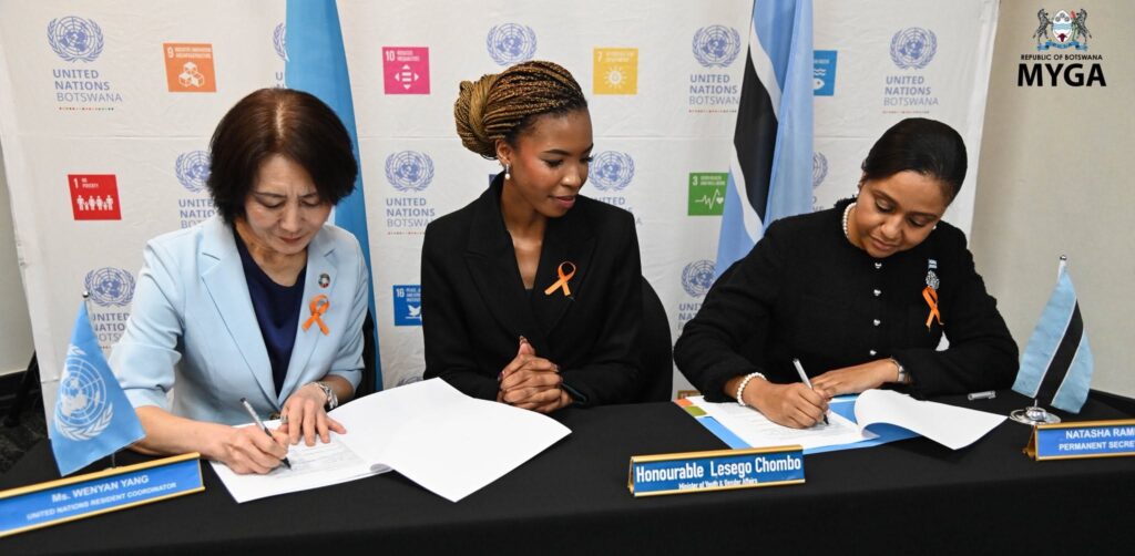 Minister of Youth and Gender Affairs Hon. Lesego Chombo and Permanent Secretary Ms Natasha Rampa join UN Resident Coordinator Ms Wenyan Yang in signing the Joint GBV Prevention and Response Programme during the High-Level Development Partners Forum in Botswana. (Photo: Ministry of Youth and Gender Affairs Botswana)