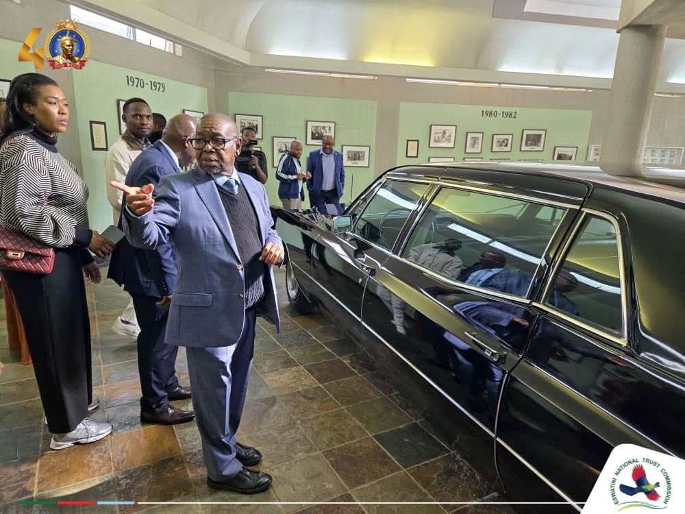 Minister Blade Nzimande gets a close look at one of the historic vehicles belonging to the late His Majesty King Sobhuza II on display at the King Sobhuza II Memorial Park. | Photo: Eswatini National Trust Commission