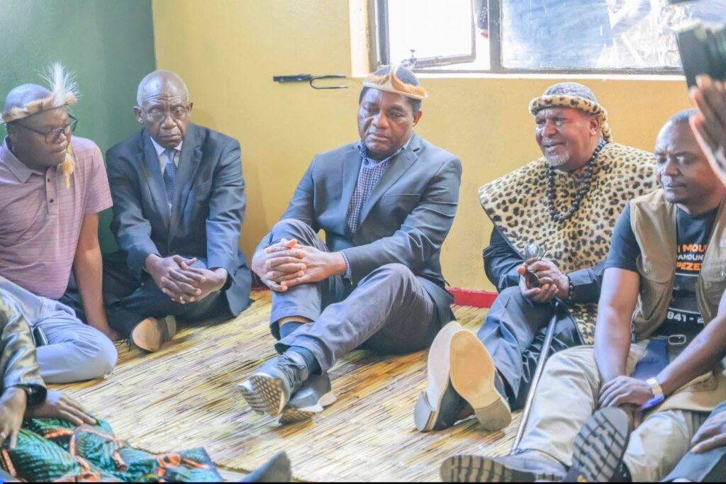 President Hakainde Hichilema consoles Paramount Chief Mpezeni IV's widow Esther Mbewe and family members at Ephendukeni Palace in Chipata. | Photo: State House Zambia