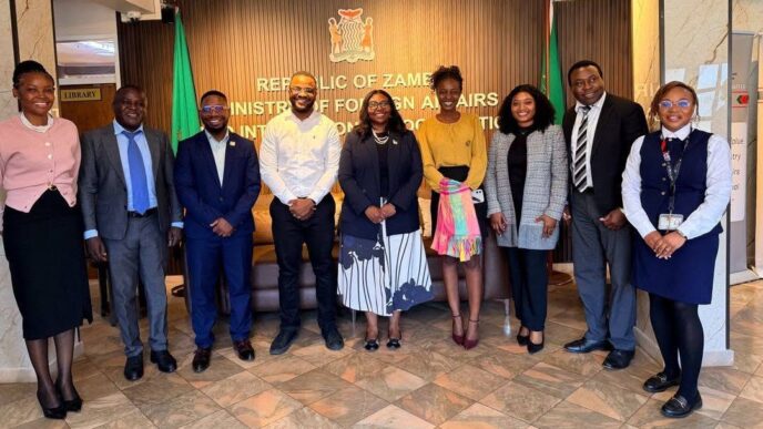 Permanent Secretary for International Relations and Cooperation Etambuyu Anamela Gundersen poses for a group photo with MTN Mobile Money Limited Zambia officials including Chief Product Officer Chikondi F. Mwanza and Remittance and Interoperability Manager Remmingtone T. Milambo following their meeting in Lusaka on 9 June 2026. | Photo: Ministry of Foreign Affairs and International Cooperation Zambia