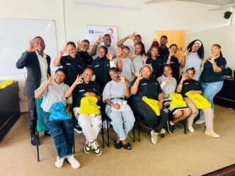 Participants and facilitators of the Sexual and Reproductive Health and Rights Ambassadors Training pose for a group photo following the three-day programme organised by Eswatini O3 Changemakers and AHF Eswatini. | Photo: UNICEF Eswatini