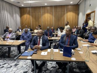 Minister of Commerce, Industry and Trade Manqoba Khumalo seated with stakeholders during the Portfolio Committee workshop on economic growth and consumer protection institutions in Mbabane. | Photo: Ministry of Commerce, Industry and Trade