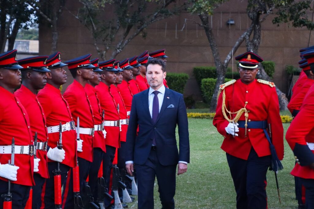 Incoming Swiss Ambassador H.E. Mirko Manzoni walks through a guard of honour at Lozitha Palace ahead of presenting his letters of credence to His Majesty King Mswati III. Photo: Eswatini Government