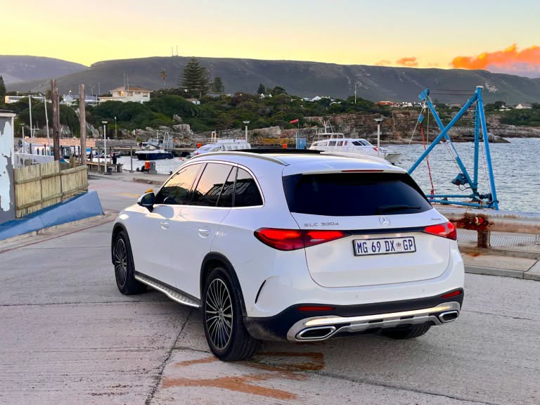 The 2026 Mercedes-Benz GLC 300d 4MATIC in AMG Line trim cuts a refined figure with its sportier front apron, chrome-dotted star grille and 20-inch AMG multi-spoke alloy wheels. (Photo: Autotrader)