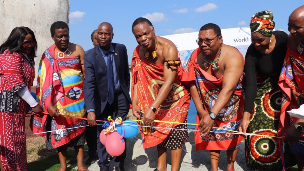 Minister of Natural Resources and Energy HRH Prince Lonkhokhela cuts the ribbon to officially commission the nine water supply schemes in Mkhiweni Inkhundla, Manzini Region. Photo: Ministry of Natural Resources and Energy