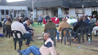 Prime Minister Russell Mmiso Dlamini and male staff from the Prime Minister's Office gather in a circle during a Lisango session marking Men's Health Month. (Photo: Supplied)