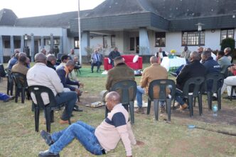 Prime Minister Russell Mmiso Dlamini and male staff from the Prime Minister's Office gather in a circle during a Lisango session marking Men's Health Month. (Photo: Supplied)