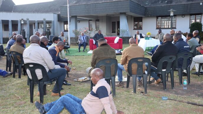 Prime Minister Russell Mmiso Dlamini and male staff from the Prime Minister's Office gather in a circle during a Lisango session marking Men's Health Month. (Photo: Supplied)