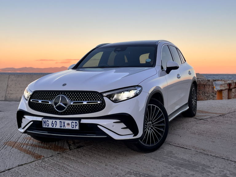 The 2026 Mercedes-Benz GLC 300d 4MATIC in AMG Line trim cuts a refined figure with its sportier front apron, chrome-dotted star grille and 20-inch AMG multi-spoke alloy wheels. (Photo: Autotrader)