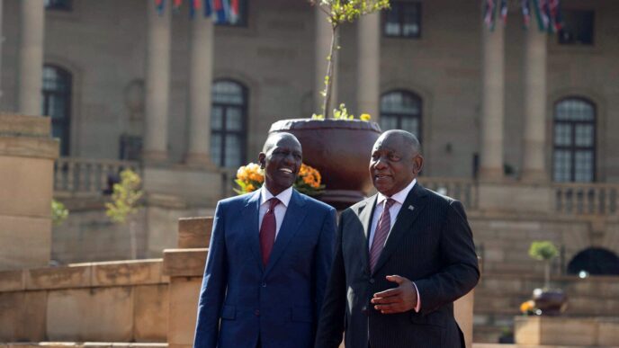 Kenyan President William Ruto and South African President Cyril Ramaphosa speak during the official welcome ceremony for Ruto's state visit, aimed at deepening economic, political, and strategic ties, at the Union Buildings in Pretoria, South Africa, June 4, 2026. REUTERS/Alet Pretorius