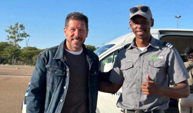 Diego Simeone, Atlético Madrid manager and the world's highest-paid football coach, pictured with a Mack Air employee at Maun International Airport before his charter flight into the Okavango Delta. (Photo: Ministry of Transport and Infrastructure — Botswana)