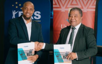 ERS Commissioner General and UNESWA Vice Chancellor Professor Justice M. Thwala exchange signed copies of the Memorandum of Understanding formalising a partnership to deliver specialised AI training for ERS employees through the UNESWA AI Academy. | Photo: ERS