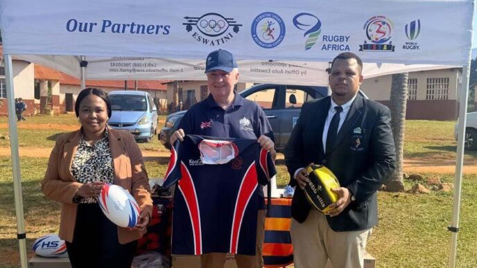 British High Commissioner Colin Wells poses with Eswatini Rugby Union and SKRUM representatives alongside some of the 26 boxes of rugby kit donated by UK NGO SOS Kit Aid to grow the game of rugby in the Kingdom. (Photo: British High Commission in Eswatini)