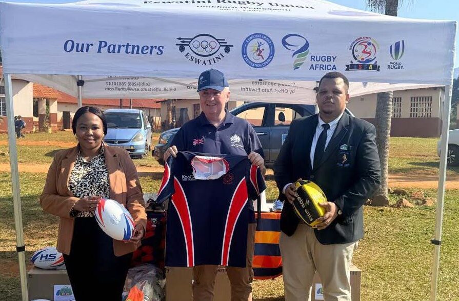British High Commissioner Colin Wells poses with Eswatini Rugby Union and SKRUM representatives alongside some of the 26 boxes of rugby kit donated by UK NGO SOS Kit Aid to grow the game of rugby in the Kingdom. (Photo: British High Commission in Eswatini)