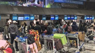 Ghanaian nationals queue at the check-in and immigration processing area at OR Tambo International Airport on Sunday ahead of their repatriation flight to Ghana, arranged by the Ghanaian High Commission in Pretoria. (Photo: Border Management Authority)