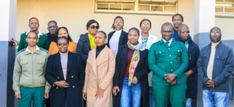 KaZakhali Private School staff pose with His Majesty's Correctional Services officers following their Career Day presentation at the school in Manzini. | Photo: His Majesty's Correctional Services