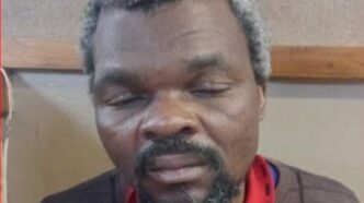 The unidentified man currently being held at Matsapha Police Station after he was found at Logoba with dog attack injuries. | Royal Eswatini Police Service