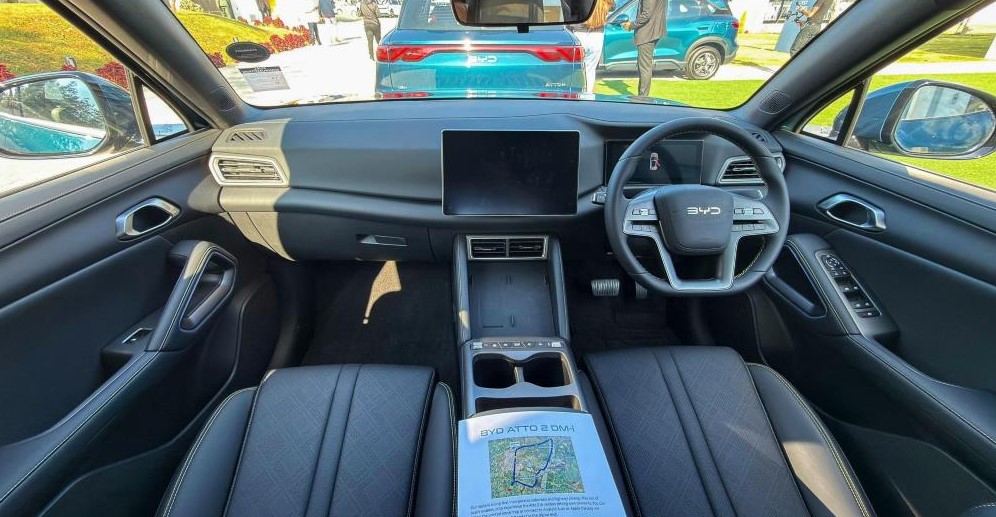 The BYD Atto 2 DM-i dashboard is dominated by an 8.8-inch digital instrument cluster and a 12.8-inch touchscreen infotainment system with Apple CarPlay and Android Auto support | Autotrader