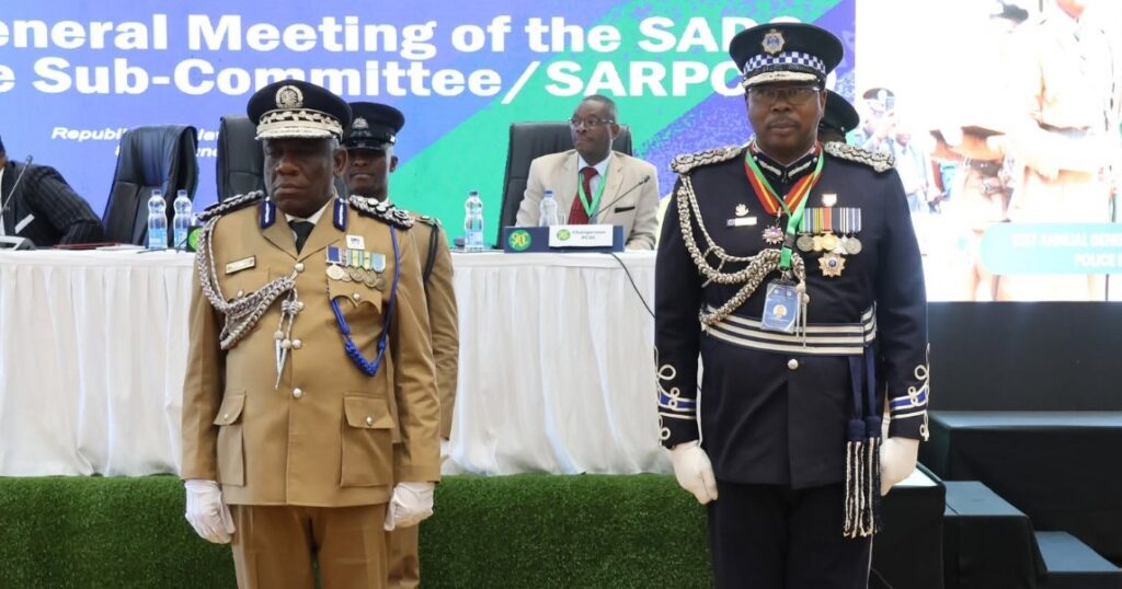 Royal Eswatini Police Service National Commissioner Manoma Vusie Masango (right) stands alongside outgoing SARPCCO Chairperson and Malawi Inspector General Richard Chakupaleza Chikoko Luhanga during the handover ceremony at the 31st SARPCCO Annual General Meeting in Lilongwe, Malawi. (Photo: REPS)