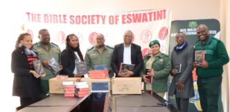 Officials from Bible Society Eswatini and His Majesty's Correctional Services pose together following the handover of 270 Bibles and two Audio Bibles at the Bible Society Eswatini offices in Mahlanya, Manzini. Photo: His Majesty's Correctional Services