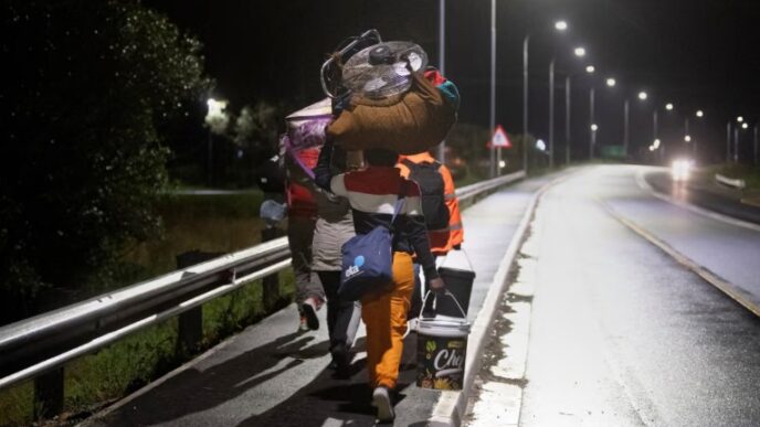 As violence against undocumented immigrants grow, the UNHCR has voiced out its concern as threats and violence persist. | Photo: Rodger Bosch/AFP/Getty Images