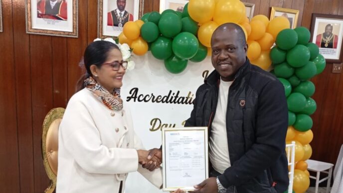 The Mayor of Manzini receives an accreditation certificate on behalf of the Municipal Council of Manzini Laboratory during World Accreditation Day commemorations on Friday, June 12, 2026