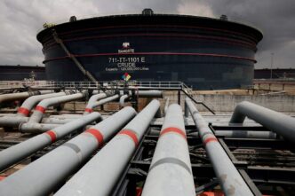 A Dangote crude oil tank is seen inside the Dangote Industries oil refinery and fertilizer plant site in the Ibeju Lekki district of Lagos, Nigeria March 2, 2026. REUTERS/Sodiq Adelakun/File Photo