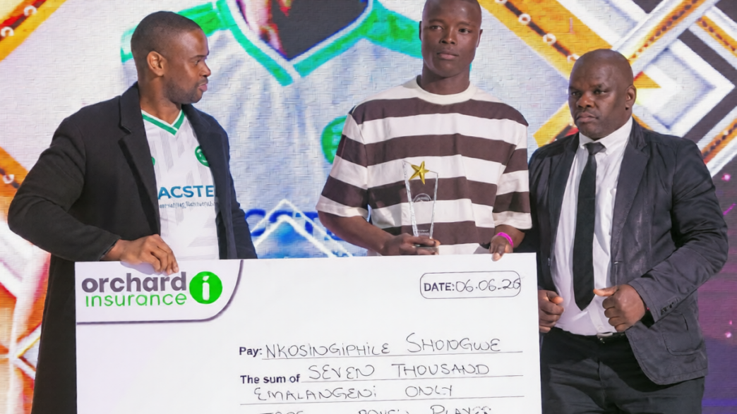 Nsingizini Hotspurs midfielder Nkosingiphile Shongwe recieving his awards. Photos: Facebook/Nsingizini Hotspurs