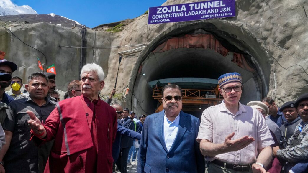 Jammu and Kashmir Lieutenant Governor Manoj Sinha with Union Minister Nitin Gadkari and state Chief Minister Omar Abdullah during the breakthrough of the Zojila Tunnel near its east portal at Minimarg, triggered by the final blast by the Union Minister, bringing the strategically important all-weather connectivity project between Kashmir and Ladakh closer to completion, in Kargil district, Ladakh. (PTI Photo)