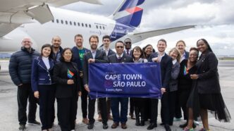Officials and partners hold a celebratory sign marking the launch of Latam Airlines' new direct route between Cape Town and São Paulo at Cape Town International Airport on Friday. (Photo: Cape Town International Airport)