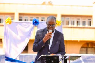 Zambia Revenue Authority Commissioner General Dingani Banda speaks during the commissioning of the Authority's 220kWp solar power system. (Photo: ZRA)