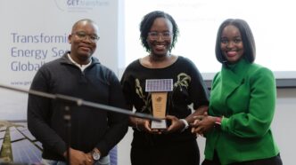 ESERA representatives receive the Distributed Generation Implementation Award from Sustainable Energy Africa during the workshop in Cape Town.