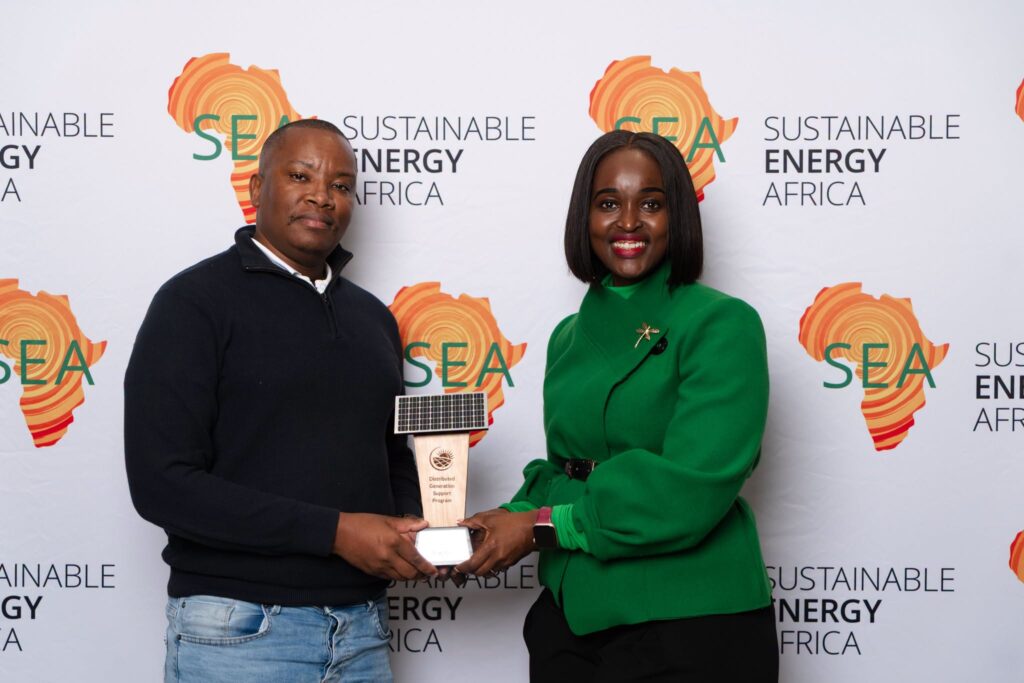 ESERA representatives receive the Distributed Generation Implementation Award from Sustainable Energy Africa during the workshop in Cape Town.