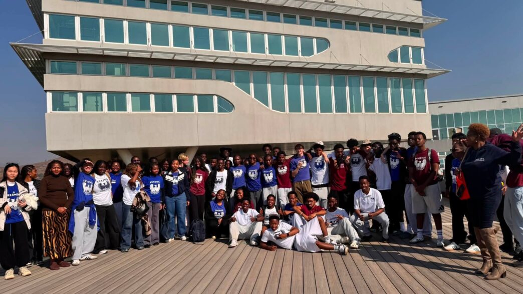 Students from Waterford KaMhlaba pose for a group photograph outside the Royal Science and Technology Park during their learning tour.